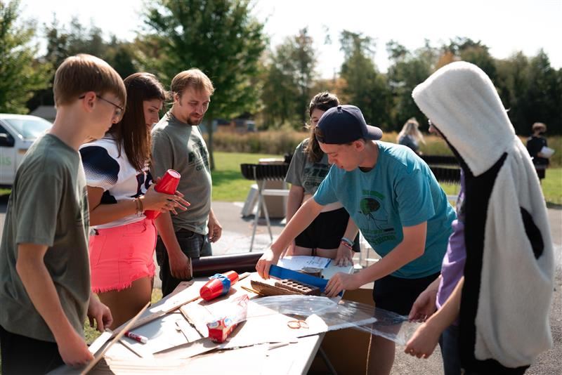  A team of students pair with their mentor and work together to complete one of the many challenges 